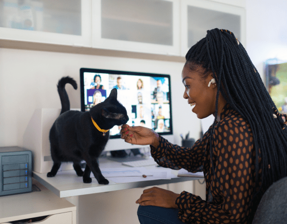 Woman at work with cat